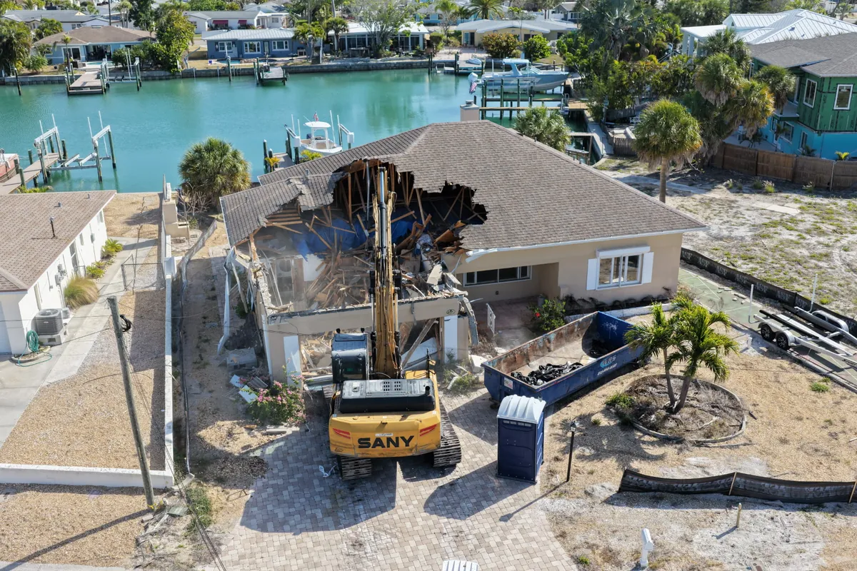 Waterfront home demolition in Cape Coral, FL