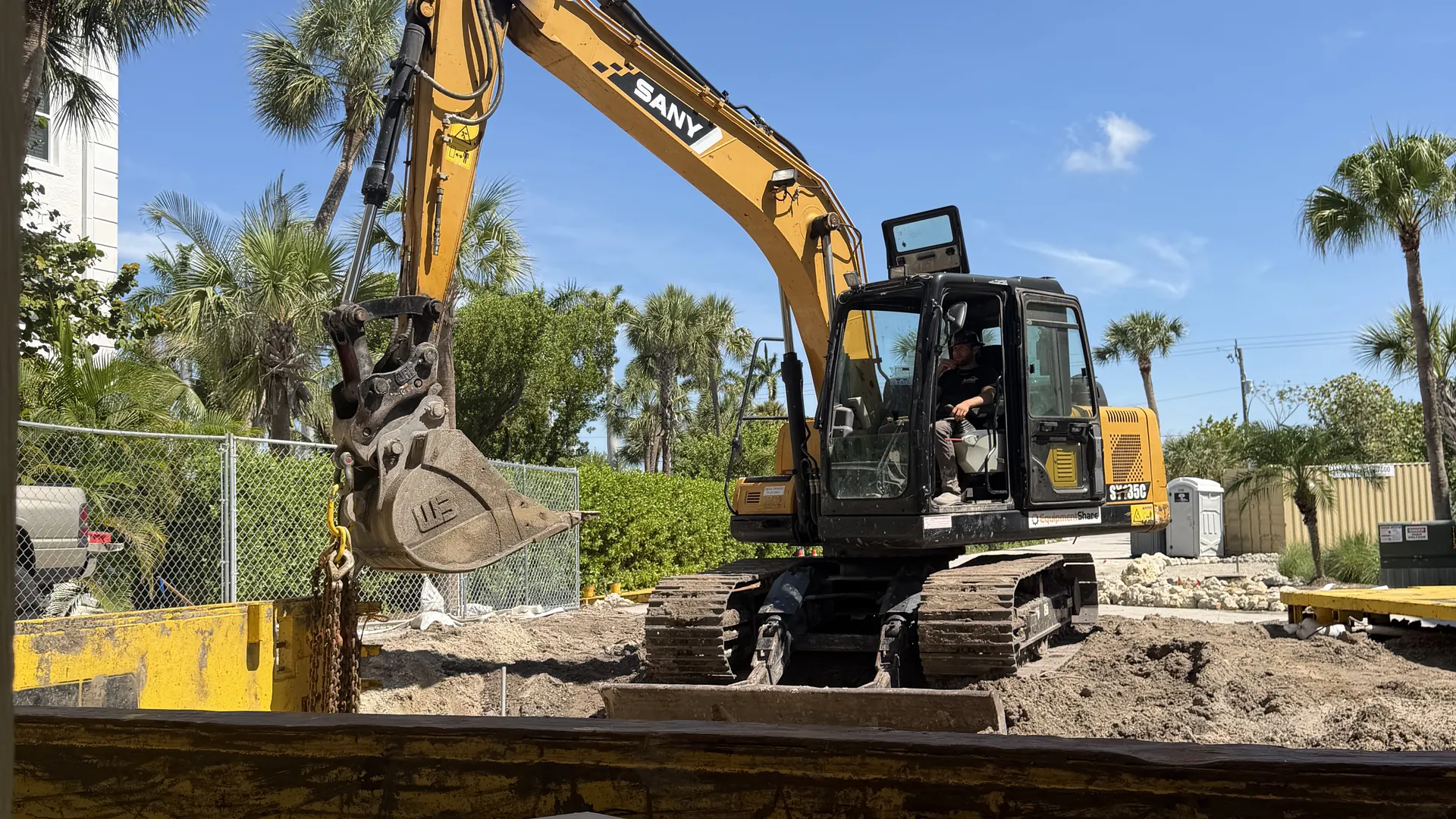 Excavation contractor working a building site in Florida Gulf Coast
